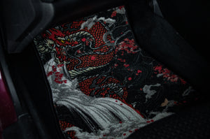 Introducing the "Dragon x Koi | Floor Mats!" by Incompletegl, these car floor mats display an intricate design of a red and black dragon enveloped by clouds and red highlights, capturing the essence of dragon lore. Perfect for your vehicle's dark carpeted interior.