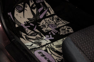 An Incompletegl Rinnegan Manga Panel!! floor mat featuring purple and black manga-style artwork adorns your car. The design includes various illustrated faces, Japanese text, and a subtle nod to Naruto's Rinnegan. This stylish mat lies next to a dark-colored seat on the vehicle's floor.