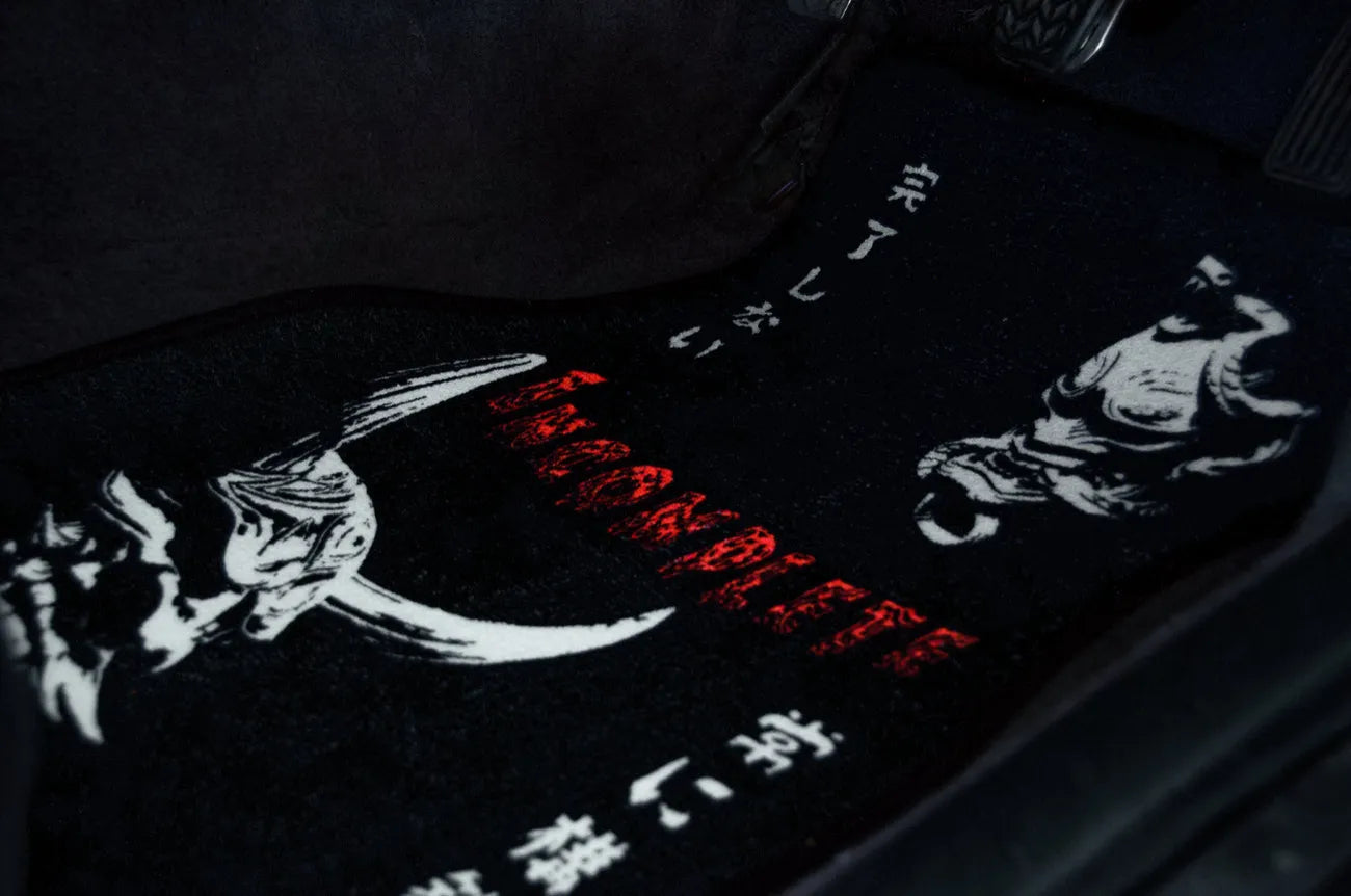 Oni floor mat in the driver footwell