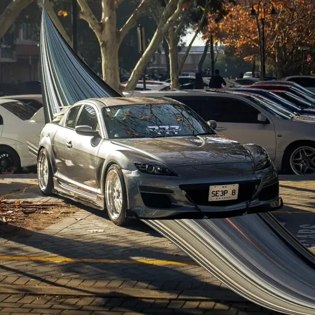 Grey RX-8 with Incomplete banner