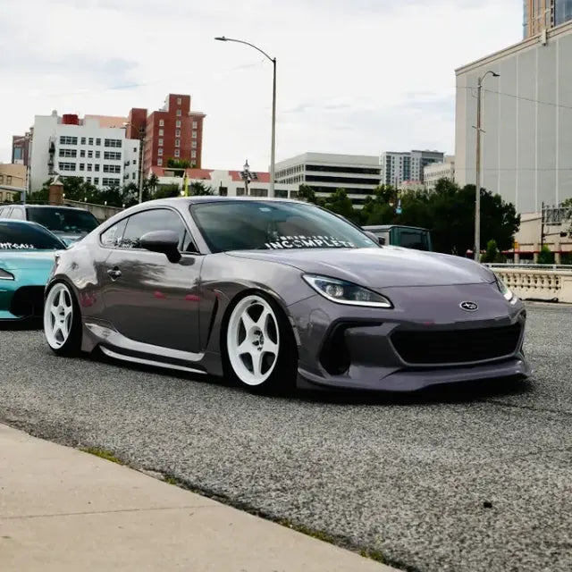 Grey BRZ with Incomplete banner