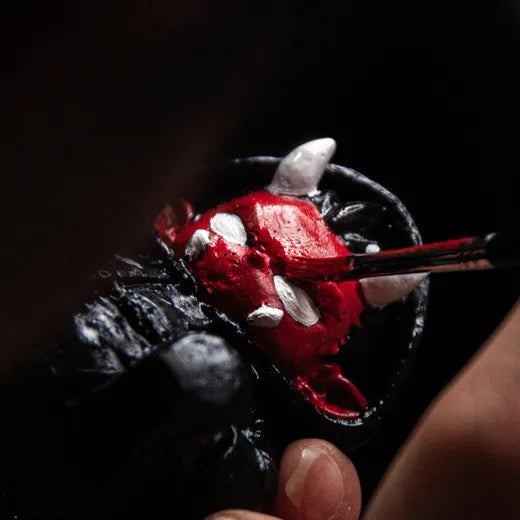 Hand-painting the Oni's face