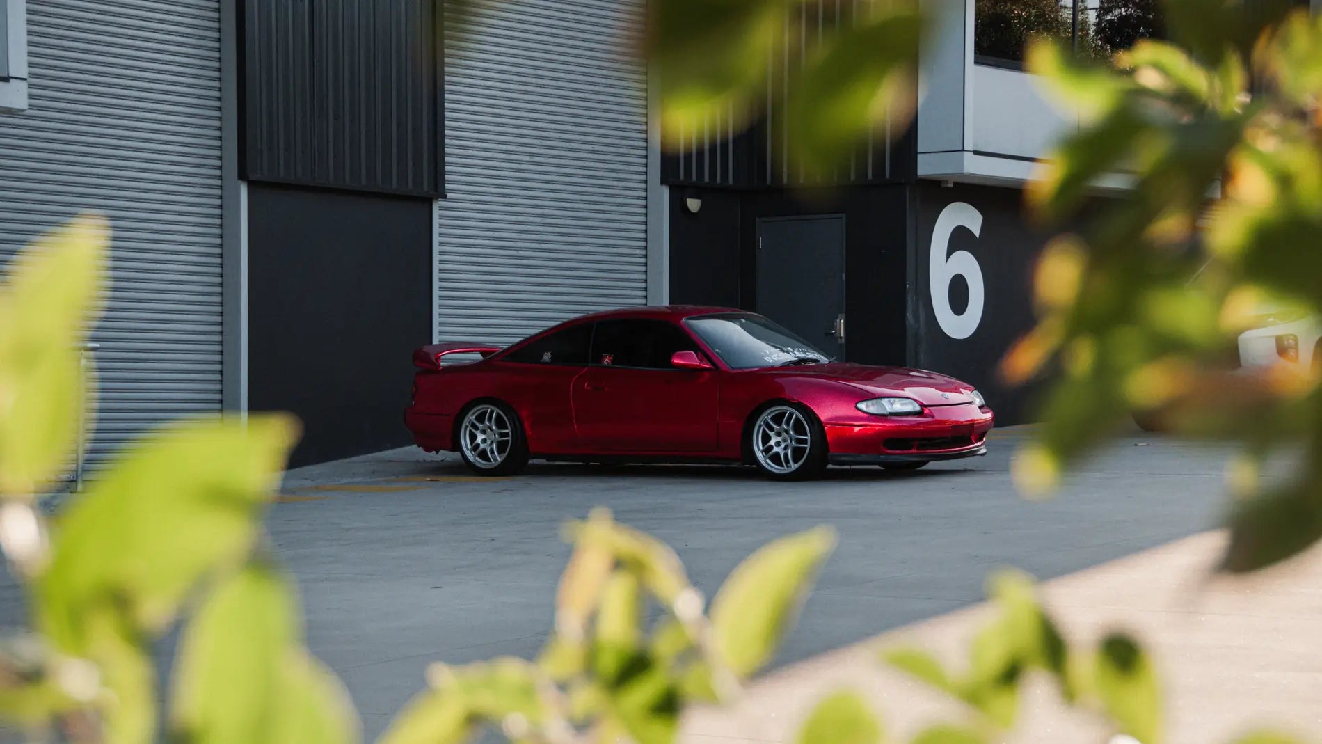 Our Mazda MX-6 wrapped in red gloss metallic vinyl